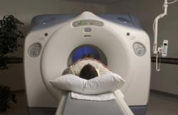 A person in hospital lying on an MRI table 